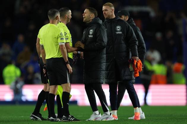 Football - 2025 2026 Premier League - Brighton & Hove Albion vs Leeds United - The Amex - Saturday 1st November 2025 Fabian Hurzeler Brighton and Hove Albion head coach shares a joke with Referee Mr Michael Oliver after the final whistle at the Amex Stadium COLORSPORT Shaun Boggust 