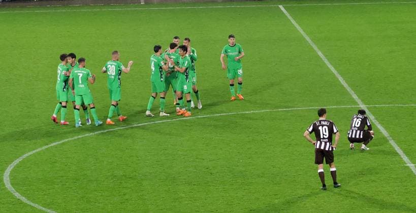 Joy and sorrow, Martijn Kaars FC St Pauli and Joel Chima Fujita FC St Pauli on the ground final whistle o 4, disappointed Hamburgers on the ground while Moenchengladbach cheers Football, 1 BL, Season 2025 2026, Men, FC St Pauli vs Borussia Moenchengladbach, Millerntor Stadion DFL REGULATIONS PROHIBIT ANY USE OF PHOTOGRAPHS AS IMAGE SEQUENCES AND OR QUASI VIDEO