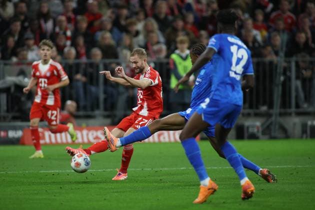 Football, Men, Bundesliga, Season 2025 2026, FC Bayern Munich Bayer 04 Leverkusen, Allianz Arena Konrad Laimer FC Bayern Munich with a shot on goal DFB, DFL regulations prohibit any use of photographs as image sequences and or quasi video