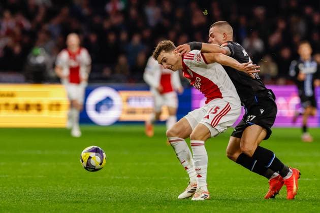 2025-11-01 Ajax v sc Heerenveen - Dutch Eredivisie AMSTERDAM, NETHERLANDS - NOVEMBER 1: Youri Baas of AFC Ajax battles for possession with Vaclav Sejk of sc Heerenveen during the Dutch Eredivisie match between Ajax and sc Heerenveen at Johan Cruijff ArenA on November 1, 2025 in Amsterdam, Netherlands. Amsterdam Johan Cruijff ArenA Netherlands Content not available for redistribution in The Netherlands directly or indirectly through any third parties. Copyright: xBenxGalx
