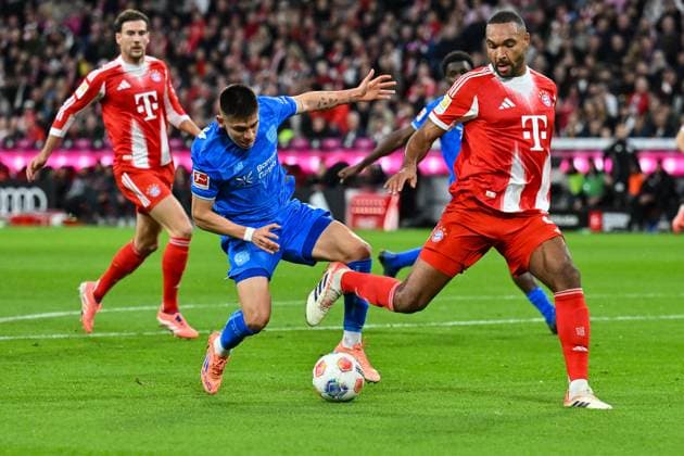 Bundesliga FC Bayern Munich Bayer 04 Leverkusen 01 11 2025 MUNICH, GERMANY 1 NOVEMBER in duel Claudio ECHEVERRI Bayer Leverkusen 9 and Jonathan TAH FC Bayern Munich 4 during the Bundesliga match between FC Bayern Munich and Bayer 04 Leverkusen on matchday 9 at Allianz Arena on November 1, 2025 in Munich, Germany DFL REGULATIONS PROHIBIT ANY USE OF PHOTOGRAPHS AS IMAGE SEQUENCES AND OR QUASI VIDEO Copyright: xBEAUTIFULxSPORTS Goldbergx