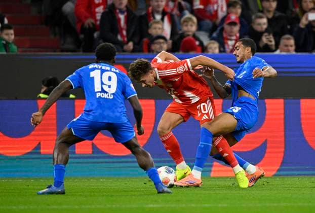 duel, action Arthur Bayer 04 Leverkusen 13 right against Tom Bischof FC Bayern Muenchen FCB 20 center Ernest Poku Bayer 04 Leverkusen 19 left FC Bayern Muenchen FCB vs Bayer 04 Leverkusen B04 01 11 2025 DFL REGULATIONS PROHIBIT ANY USE OF PHOTOGRAPHS AS IMAGE SEQUENCES AND OR QUASI VIDEO FC Bayern Muenchen FCB vs Bayer 04 Leverkusen B04