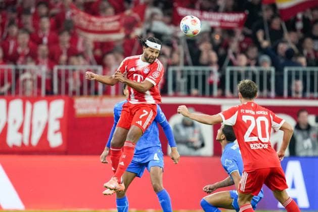 in duel, action, with Serge Gnabry 7 FC Bayern Muenchen , FC Bayern Muenchen vs Bayer 04 Leverkusen, Soccer, 1 Bundesliga, 9 Matchday, 01 11 2025 DFB regulations prohibit any use of photographs as image sequences and or quasi video Muenchen Bayern Germany Copyright: xkolbert-press MarcxMarasescux