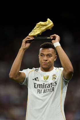 Kylian Mbappe (Real Madrid CF) presents the Golden Boot trophy during the LaLiga EA Sports match between Real Madrid v Valencia CF at Santiago BernabÃ u on November 1, 2025 in Madrid, Spain. (Photo by Manu Reino DeFodi Images) Kylian Mbappe Real Madrid CF presents the Golden Boot trophy during the LaLiga EA Sports match between Real Madrid v Valencia CF at Santiago BernabÃ u on November 1, 2025 in Madrid, Spain Photo by Manu Reino DeFodi Images