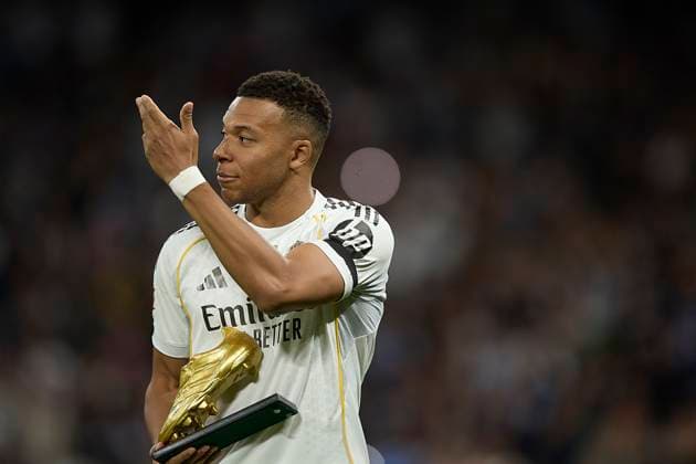 Kylian Mbappe (Real Madrid CF) presents the Golden Boot trophy during the LaLiga EA Sports match between Real Madrid v Valencia CF at Santiago BernabÃ u on November 1, 2025 in Madrid, Spain. (Photo by Manu Reino DeFodi Images) Kylian Mbappe Real Madrid CF presents the Golden Boot trophy during the LaLiga EA Sports match between Real Madrid v Valencia CF at Santiago BernabÃ u on November 1, 2025 in Madrid, Spain Photo by Manu Reino DeFodi Images