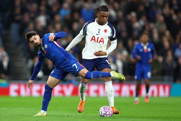 London, England, 1st November 2025. Pedro Neto of Chelsea and Kevin Danso of Tottenham Hotspur challenge for the ball during the Tottenham Hotspur vs Chelsea Premier League match at the Tottenham Hotspur Stadium, London. Picture credit should read: Paul Terry Sportimage EDITORIAL USE ONLY. No use with unauthorised audio, video, data, fixture lists, club league logos or live services. Online in-match use limited to 120 images, no video emulation. No use in betting, games or single club league player publications. SPI_067_PT_Tottenham_Chelsea SPI-4252-0067