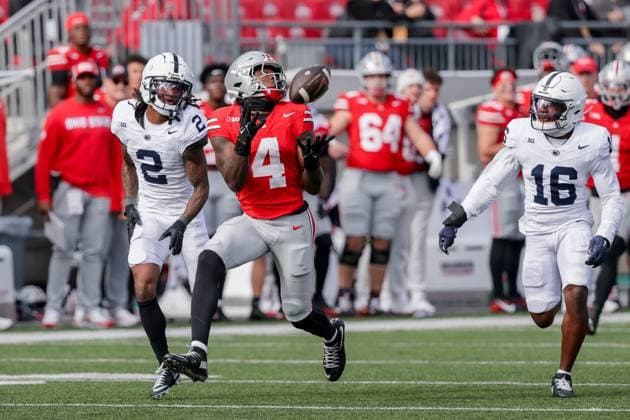 November 1, 2025, Columbus, Ohio, U.S: Ohio State Buckeyes wide receiver Jeremiah Smith (4) catches a pass behind Penn State Nittany Lions safety King MacK (16) during the game between the Penn State Nittany Lions and the Ohio State Buckeyes at Ohio Stadium, Columbus, Ohio. Columbus U.S - ZUMAs304 20251101_zaf_s304_051 Copyright: xScottxStuartx