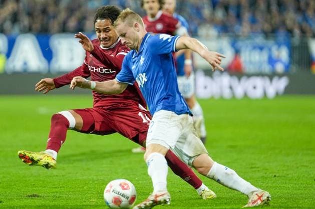 Soccer 2 Bundesliga, Matchday 11, SV Darmstadt 98 Arminia Bielefeld on 01 11 2025 in Darmstadt Merck Stadion am Böllenfalltor , Germany, Season 2025 2026 DFL REGULATIONS PROHIBIT ANY USE OF PHOTOGRAPHS AS IMAGE SEQUENCES AND OR QUASI VIDEO Fabian Holland 32, SVD in duel with Monju Thaddaus Momuluh 14, DSC Darmstadt Merck Stadion am Böllenfalltor Germany Copyright: xChristophxKinzingerx