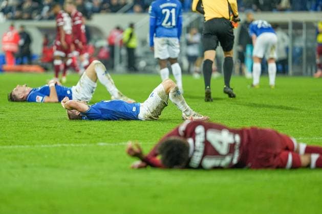 Soccer 2 Bundesliga, Matchday 11, SV Darmstadt 98 Arminia Bielefeld on 01 11 2025 in Darmstadt Merck Stadion am Böllenfalltor , Germany, Season 2025 2026 DFL REGULATIONS PROHIBIT ANY USE OF PHOTOGRAPHS AS IMAGE SEQUENCES AND OR QUASI VIDEO Players lie on the ground after the final whistle from l n r Matej Maglica 5, SVD , Fabian Holland 32, SVD and Monju Thaddaus Momuluh 14, DSC Darmstadt Merck Stadion am Böllenfalltor Germany Copyright: xChristophxKinzingerx