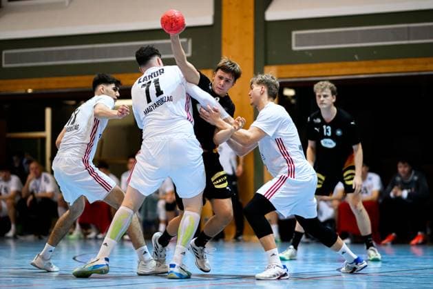 Erlangen handball national match U20 Germany Hungary from left Zalan Zakor, Michel Fuchs Germany Erlangen Karl Heinz Hirsemann Halle Bayern Germany