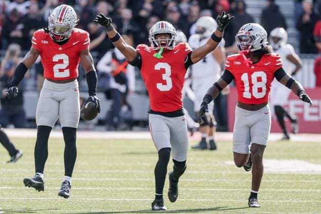November 1, 2025, Columbus, Ohio, U.S: Ohio State Buckeyes safety Caleb Downs (2), Ohio State Buckeyes cornerback Lorenzo Styles Jr. (3) and Ohio State Buckeyes safety Jaylen McClain (18) celebrate after Caleb DownsÃ¢â‚¬â ¢ interception during the game between the Penn State Nittany Lions and the Ohio State Buckeyes at Ohio Stadium, Columbus, Ohio. Columbus U.S - ZUMAs304 20251101_zaf_s304_038 Copyright: xScottxStuartx