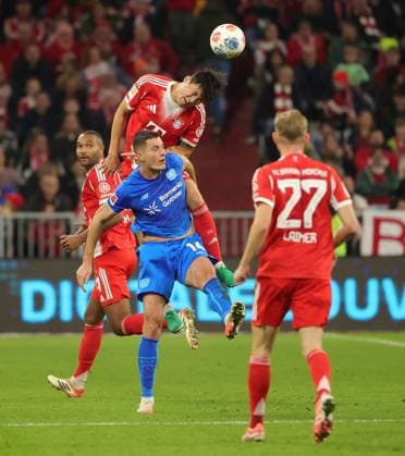 (251102) -- MUNICH, Nov. 2, 2025 -- Kim Min-Jae (top) of Bayern Munich and Patrik Schick (bottom C) of Bayer 04 Leverkusen head for the ball during the German first division Bundesliga football match between Bayern Munich and Bayer 04 Leverkusen in Munich, Germany, Nov. 1, 2025. (Photo by Xinhua) (SP)GERMANY-MUNICH-FOOTBALL-BUNDESLIGA-BAYERN MUNICH VS LEVERKUSEN PhilippexRuiz 