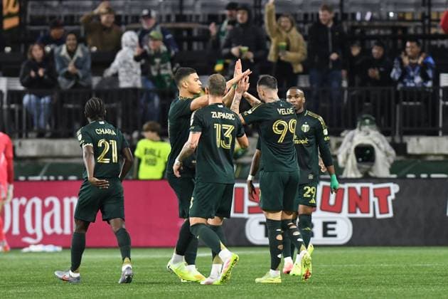 PORTLAND, OR - NOVEMBER 01: Portland Timbers forward Kristoffer Velde (99) is congratulates by teammates after scoring a goal I the first half during the second game of the MLS, Fussball Herren, USA Cup Playoffs Round One Best-of-3 Series match between the Portland Timbers and San Diego FC on November 1, 2025 at Providence Park in Portland, Oregon. (Photo by Brian Murphy Icon Sportswire) SOCCER: NOV 01 MLS Cup Playoffs Portland Timbers vs San Diego FC EDITORIAL USE ONLY Icon251101410