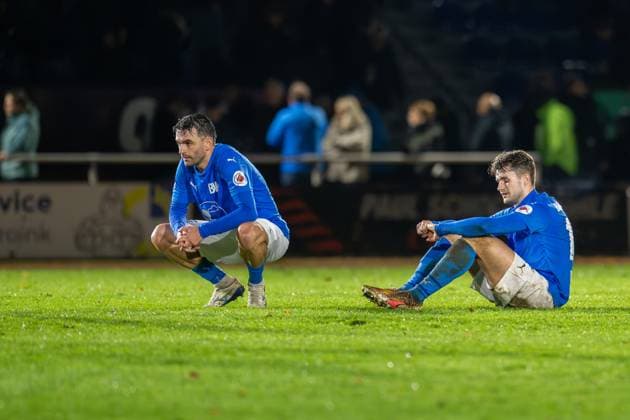 Football, Regionalliga Nord, BW Lohne Hamburger SV II , Matchday 17, Season 2025 2026, 1 11 2025 Rilind Neziri Blau Weiss Lohne 23 with Sandro Heskamp Blau Weiss Lohne 17 after the final whistle , Lohne Heinz Dettmer Stadion Niedersachsen Germany