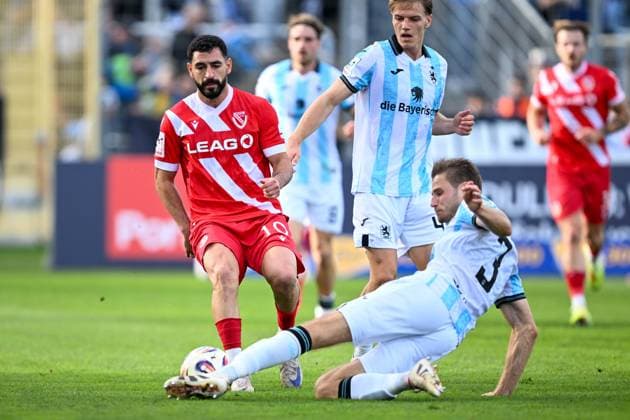 3 Liga 25 26 TSV 1860 München FC Energie Cottbus on 01 11 2025 at Stadion Gruenwalder Straße in Munich Tolcay Cigerci Cottbus in a duel against Siemen Voet Muenchen MT
