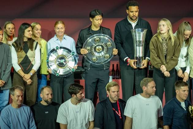 The German Champions of FC Bayern 2024 2025, with Hiroki Ito FC Bayern Muenchen, 21 , Elias Harris FC Bayern Basketball, 20 , GER, FC Bayern Muenchen, Football, Bundesliga, Annual General Meeting FC Bayern Muenchen eV 2025, 02 11 2025, DFL DFB REGULATES PROHIBIT ANY USE OF PHOTOGRAPHS AS IMAGE SEQUENCES AND OR QUASI VIDEO, GER, FC Bayern Muenchen, Football, Bundesliga, Annual General Meeting FC Bayern Muenchen eV 2025, 02 11 2025 Muenchen Copyright: xEibner-Pressefotox EP_EER