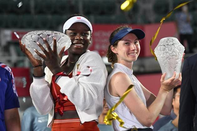 Victoria Mboko and Cristina Bucsa In WTA250 Canadian tennis player Victoria Mboko and Moldovan-Spanish tennis player Cristina Bucsa catch the trophy at the Hong Kong Tennis Open on November 2, 2025 in Hong Kong. (Photo by Kobe Li Nexpher Images) Hong Kong