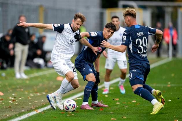 from left Lukas Klünter SVWM, 24 , Deniz Zeitler TSG II, 38 , Florian Bähr TSG II, 39 , duel, duel scene, duel, tackle, tackling, dynamics, action, action, 02 11 2025, Sinsheim Germany , Football, 3 Liga, TSG 1899 Hoffenheim II SV Waldhof Mannheim, DFB DFL REGULATIONS PROHIBIT ANY USE OF PHOTOGRAPHS AS IMAGE SEQUENCES AND OR QUASI VIDEO xozx