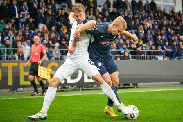 Soccer 3 Liga, Matchday 13, TSG Hoffenheim II SV Waldhof Mannheim on 02 11 2025 in Sinsheim Dietmar Hopp Stadion , Germany, Season 2025 2026 DFL REGULATIONS PROHIBIT ANY USE OF PHOTOGRAPHS AS IMAGE SEQUENCES AND OR QUASI VIDEO Lukas Klünter 24, SVWM in duel with Lässig, Valentin 6, TSGII Sinsheim Dietmar Hopp Stadion Germany Copyright: xChristophxKinzingerx