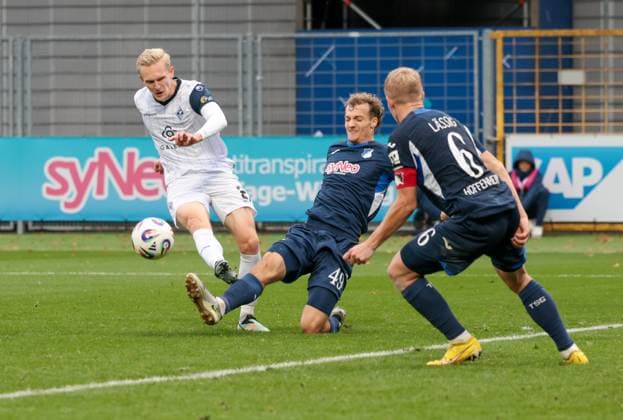 02 11 2025, xhettx, Soccer 3 Liga, TSG 1899 Hoffenheim U23 SV Waldhof Mannheim v l Julian Rieckmann SV Waldhof Mannheim, 21 with the shot, blocked by Yannik Luka Lührs TSG Hoffenheim U23, 49 DFL DFB REGULATIONS PROHIBIT ANY USE OF PHOTOGRAPHS as IMAGE SEQUENCES and or QUASI VIDEO Hoffenheim
