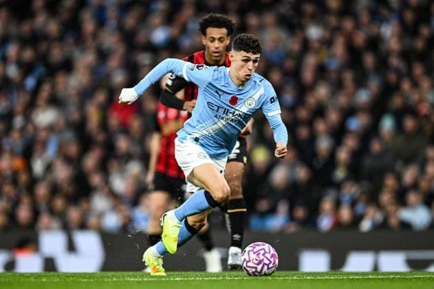 2nd November 2025; Etihad Stadium, Manchester, Lancashire, England; Premier League Football, Manchester City versus AFC Bournemouth; Phil Foden of Manchester City runs past Tyler Adams of AFC Bournemouth  GodfreyxPitt
