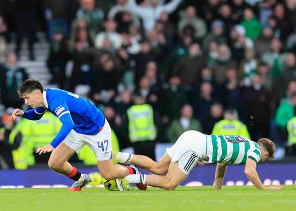 Celtic v Rangers Premier Sports Cup Mikey Moore of Rangers (left) competes for the ball with James Forrest of Celtic during the Premier Sports Cup Semi-Final match between Celtic and Rangers at Hampden Park, Glasgow UK Newspapers OUT Copyright: xFredxPalmerx FIL-22443-0162