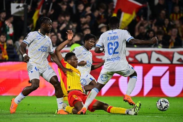 FOOTBALL : Lens vs Lorient - Ligue 1 - 02 11 2025 Mamadou Sangare ( 8 - Lens ) and Arthur Avom Ebong ( 62 - FC Lorient ) during the Ligue 1 match between RC Lens and FC Lorient at Stade Felix Bollaert on November 02, 2025 in Lens, France. ( Photo by federico pestellini psnewz ) - LensFrance  Copyright: xFedericoxPestellinix