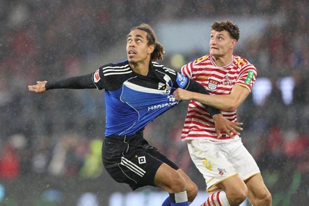 Yussuf Poulsen (Hamburger SV) und Eric Martel (1. FC Koeln) im Zweikampf waehrend des spiels der Bundesliga zwischen 1. FC Köln und Hamburger SV, RheinEnergieSTADION am 02. November 2025 in Köln, Deutschland. (Foto von Oliver Kaelke DeFodi Images) +++ Yussuf Poulsen (Hamburger SV) und Eric Martel (1. FC Koeln) battle for the ball during the Bundesliga match between 1. FC Köln and Hamburger SV at RheinEnergieSTADION on November 2, 2025 in Köln, Germany. (Photo by Oliver Kaelke DeFodi Images) DFL regulations prohibit any use of photographs as image sequences and or quasi-video. (Photo by Oliver Kaelke DeFodi Images) Yussuf Poulsen Hamburger SV und Eric Martel 1 FC Koeln im Zweikampf waehrend des spiels der Bundesliga zwischen 1 FC Köln und Hamburger SV, RheinEnergieSTADION am 02 November 2025 in Köln, Germany Photo by Oliver Kaelke DeFodi Images Yussuf Poulsen Hamburger SV und Eric Martel 1 FC Koeln battle for the ball during the Bundesliga match between 1 FC Köln and Hamburger SV at RheinEnergieSTADION on November 2, 2025 in Köln, Germany Photo by Oliver Kaelke DeFodi Images DFL regulations prohibit any use of photographs as image sequences and or quasi video Photo by Oliver Kaelke DeFodi Images