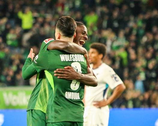 Germany Bundesliga 2025 26, 9 Matchday VfL Wolfsburg vs TSG Hoffenheim Volkswagen Arena Wolfsburg Goal celebration Mohamed Amoura VfL Wolfsburg, 9 Saël Kumbedi Sael Kumbedi VfL Wolfsburg, 26 Copyright: xAymanxAlahmedx