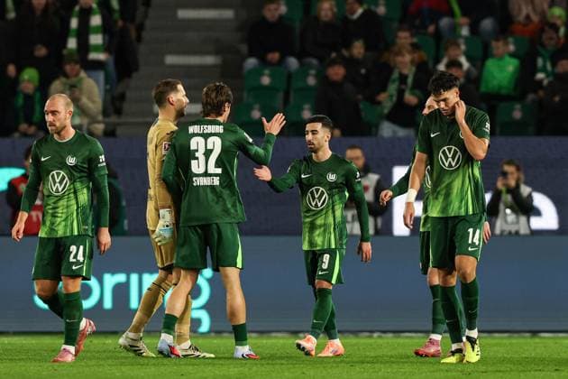 Goalscorer Mohamed Amoura VfL Wolfsburg,9 scores to 2 2 1 Soccer Bundesliga Season 2025 2026 VfL Wolfsburg vs TSG Hoffenheim at the Volkswagen Arena in Wolfsburg Action,Soccer,Germany,Man,Men,02 11 2025