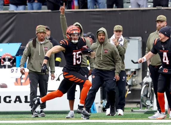 Cincinnati Bengals kick returner Charlie Jones (15) returns the opening kickoff for a touchdown against the Chicago Bears during the first half of play of a preseason game at Paycor Stadium on Sunday, November 2, 2025 in Cincinnati, Ohio.  KYP20251102001 JOHNxSOMMERSxII