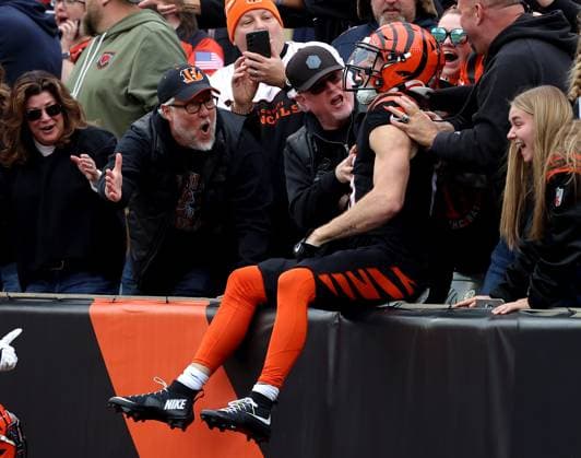 Cincinnati Bengals kick returner Charlie Jones (15) celebrates returning the opening kickoff for a touchdown against the Chicago Bears during the first half of play at Paycor Stadium on Sunday, November 2, 2025 in Cincinnati, Ohio.  KYP20251102008 JOHNxSOMMERSxII
