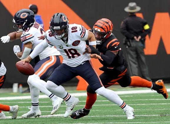 Chicago Bears quarterback Caleb Williams (18) is sacked by Cincinnati Bengals Joseph Ossai (58) during the first half of play at Paycor Stadium on Sunday, November 2, in Cincinnati, Ohio.  KYP20251102011 JOHNxSOMMERSxII