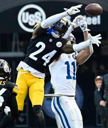 Pittsburgh Steelers cornerback Joey Porter Jr. (24) bats the pass away from Indianapolis Colts wide receiver Michael Pittman Jr. (11) during the fourth quarter of the Steelers 27-20 win at Acrisure Stadium Sunday, November 2, 2025 in Pittsburgh.  PIT2025110222 ARCHIExCARPENTER