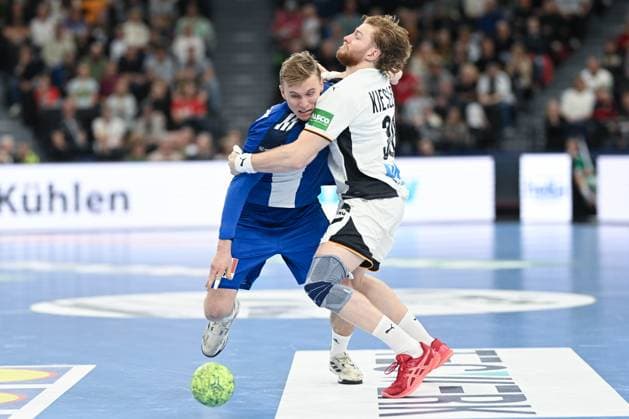 DHB 25 26 Germany Iceland on 02 11 2025 at SAP Garden in Munich Bjarki Mar Elisson Iceland in a duel against Julian Köster Koester Germany MT