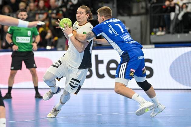 DHB 25 26 Germany Iceland on 02 11 2025 at SAP Garden in Munich Juri Knorr Germany in a duel against Viggo Kristjansson Erlangen Iceland MT