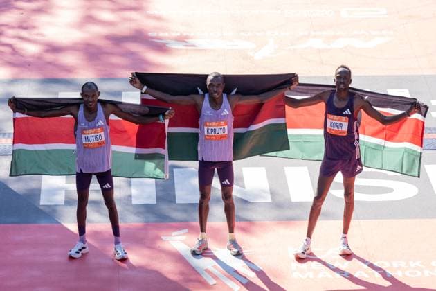 2025 New York City TCS Marathon Alexander Mutiso of Kenya winner of 2nd place, Benson Kipruto of Kenya winner of 1st place, Albert Korir of Kenya winner of 3rd place of NYC TCS Marathon in professional men s open division pose at finish line in Central Park in New York, NY on November 2, 2025. New York New York United States Copyright: LevxRadin