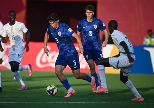 Football, Junior U 17 World Cup 2025 Preliminary Round 03 11 2025 Group C Senegal Croatia Tino Kusanovic left, Croatia 1 FC Nuremberg Croatia 1 FC Nuremberg vs Talla Ndiaye right, Senegal