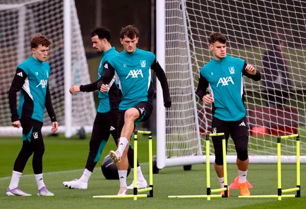 3rd November 2025; Anfield, Liverpool, Merseyside, England; UEFA Champions League Football, Liverpool versus Real Madrid press conference, PK, Pressekonferenz Calvin Ramsay and Milos Kerkez of Liverpool warm up before the open training session ahead of tomorrow s Champions League Group match vs Real Madrid  AlanxMartin