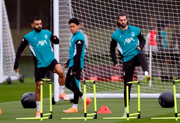 3rd November 2025; Anfield, Liverpool, Merseyside, England; UEFA Champions League Football, Liverpool versus Real Madrid press conference, PK, Pressekonferenz Mohamed Salah and Dominik Szoboszlai of Liverpool warm up before the open training session ahead of tomorrow s Champions League Group match vs Real Madrid  AlanxMartin