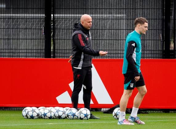 3rd November 2025; Anfield, Liverpool, Merseyside, England; UEFA Champions League Football, Liverpool versus Real Madrid press conference, PK, Pressekonferenz Liverpool manager Arne Slot oversees the open training session with Florian Wirtz in the foreground ahead of tomorrow s Champions League Group match vs Real Madrid  AlanxMartin