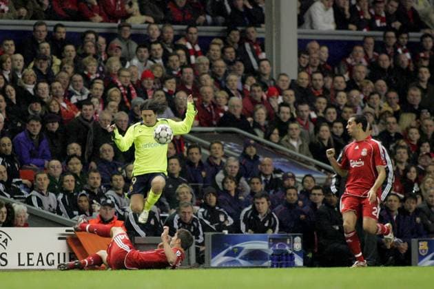 LIVERPOOL, UNITED KINGDOM: 06 MARCH 2007: Lionel Messi (top) of Barcelona is in action during the UEFA Champions League 2006-07 Round of 16, 2nd leg soccer match between Liverpool FC and FC Barcelona, Barca at Anfield Stadium, Liverpool, United Kingdom on 06 March 2007. Liverpool FC v FC Barcelona UCL_2006_2007