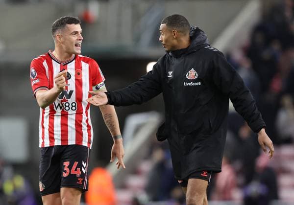 Sunderland, England, 3rd November 2025. Granit Xhaka of Sunderland (l) talks to Wilson Isidor of Sunderland at the end of the game during the Sunderland vs Everton Premier League match at the Stadium Of Light, Sunderland. Picture credit should read: Nigel Roddis Sportimage EDITORIAL USE ONLY. No use with unauthorised audio, video, data, fixture lists, club league logos or live services. Online in-match use limited to 120 images, no video emulation. No use in betting, games or single club league player publications. SPI_055_NR_SUND_EVER SPI-4261-0055