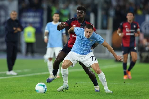 Football: Serie A Enilive 2025-2026 matchday, 10, SS Lazio and Cagliari Calcio Rome, Italy November 3, 2025: Michel Ndary Adopo of Cagliari Calcio , Adam Marusic of Lazio seen in action during the Serie A Enilive 2025-2026 football matchday 10, between SS Lazio vs Cagliari Calcio at Olympic Stadium. rome olympic stadium italy italy Copyright: xmarcoxiacobucci
