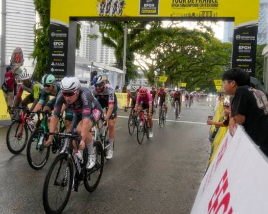 2nd November 2025, Marina Bay Circuit, Marina Bay, Singapore; Tour de France EFGH Singapore Criterium 2025 Cycling; The Pelaton passes through the start finish line  StevexFlynn