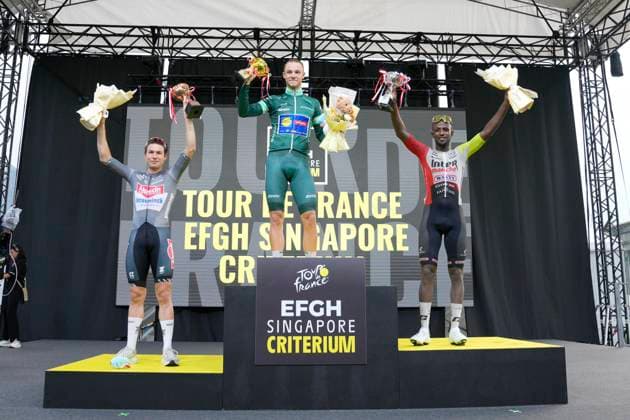 2nd November 2025, Marina Bay Circuit, Marina Bay, Singapore; Tour de France EFGH Singapore Criterium 2025 Cycling; (l-r) Jasper Philipsen of Team Alpecin Deceunick, Jonathan Milan of Team Lidl Trek and Biniam Girmay of Team Intermarche Wanty wave to the crowd after receiving their trophies  StevexFlynn