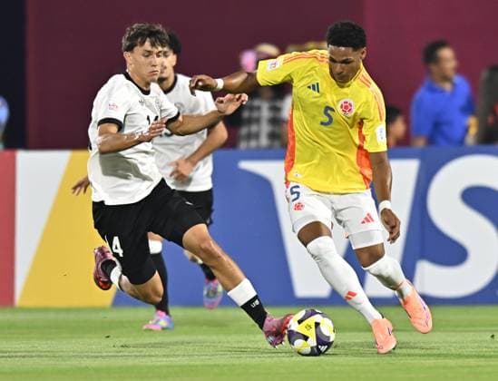 Germany v Colombia: Group G - FIFA U-17 World Cup Qatar 2025 Toni LANGSTEINER of Germany and Criss MACIAS of Colombia in action during the FIFA U-17 World Cup Qatar 2025 Group G match between Germany and Colombia in Doha, Qatar, on November 4, 2025 DOHA Qatar Copyright: xNOUSHADx