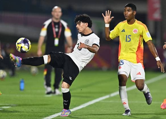 Germany v Colombia: Group G - FIFA U-17 World Cup Qatar 2025 Abdulbaki AL KHALAF (L) of Germany and Miguel SOLARTE of Colombia in action during the FIFA U-17 World Cup Qatar 2025 Group G match between Germany and Colombia in Doha, Qatar, on November 4, 2025 DOHA Qatar Copyright: xNOUSHADx