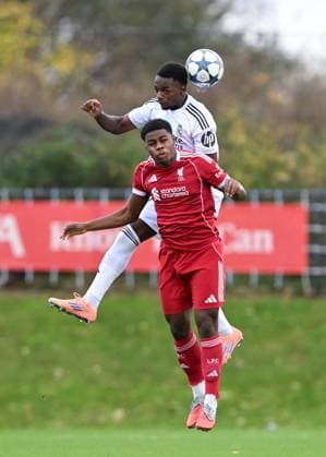 Liverpool, England, 4th November 2025. Keyrol Figueroa of Liverpool and Ariel Nkoghe of Real Madrid battle for the ball during the Liverpool U19 vs Real Madrid U19 UEFA Youth League match at The Liverpool Football Academy, Liverpool. Picture credit should read: Cody Froggatt Sportimage EDITORIAL USE ONLY. No use with unauthorised audio, video, data, fixture lists, club league logos or live services. Online in-match use limited to 120 images, no video emulation. No use in betting, games or single club league player publications. SPI_017_CF_LIVERPOOL_U19_V_REAL_MADRID_U19 SPI-4262-0017