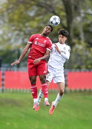 Liverpool, England, 4th November 2025. Keyrol Figueroa of Liverpool and Mario Rivas of Real Madrid battle for the ball during the Liverpool U19 vs Real Madrid U19 UEFA Youth League match at The Liverpool Football Academy, Liverpool. Picture credit should read: Cody Froggatt Sportimage EDITORIAL USE ONLY. No use with unauthorised audio, video, data, fixture lists, club league logos or live services. Online in-match use limited to 120 images, no video emulation. No use in betting, games or single club league player publications. SPI_018_CF_LIVERPOOL_U19_V_REAL_MADRID_U19 SPI-4262-0018